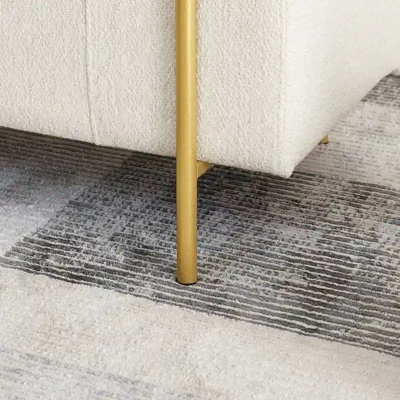 Banc de rangement capitonné en lin avec accoudoirs cylindriques et pieds en métal doré