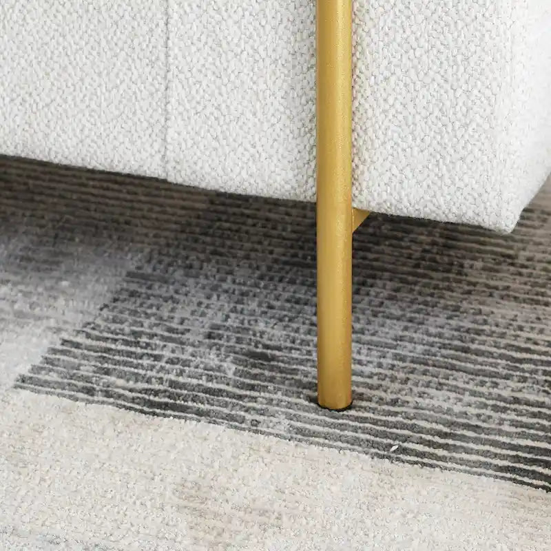 Banc de rangement capitonné en lin avec accoudoirs cylindriques et pieds en métal doré