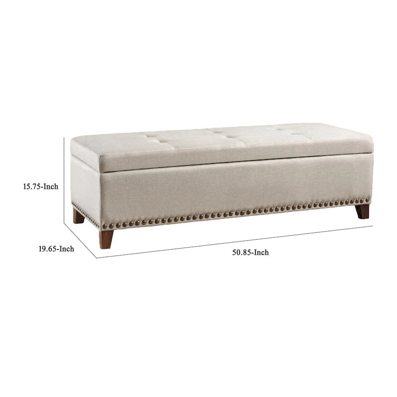Banc de rangement ottoman Nancy, 130 cm, tissu beige, bordure cloutée en laiton