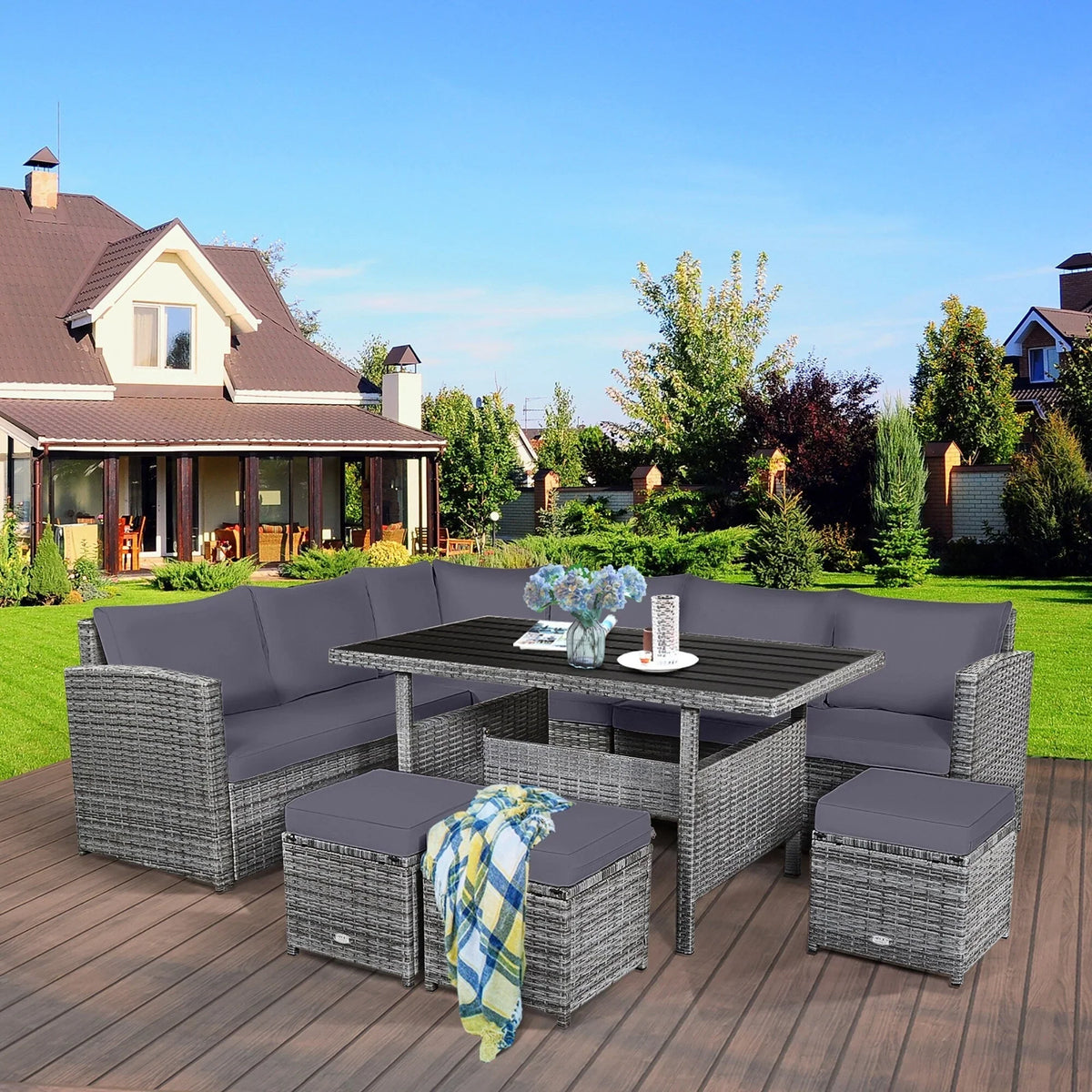 Ensemble de salle à manger Costway 7 pièces en rotin pour terrasse, canapé sectionnel et pouf - Voir détails